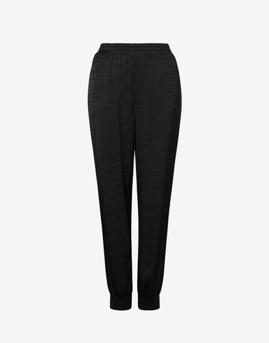Jogging In Twill Allover Logo - Moschino - Modalova