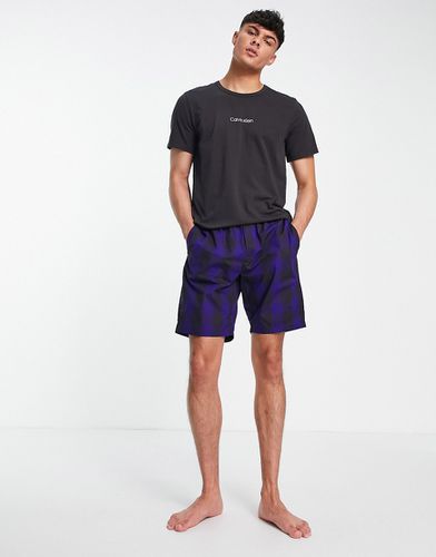 Completo pigiama con T-shirt e pantaloncini - Calvin Klein - Modalova