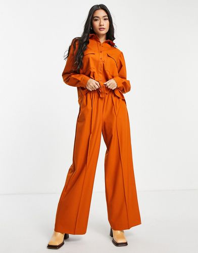 Pantaloni a fondo ampio in misto tessuto riciclato color ruggine in coordinato - Aligne - Modalova
