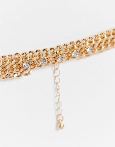 Collana oro con catena barbazzale a strati e cristalli - ASOS DESIGN - Modalova
