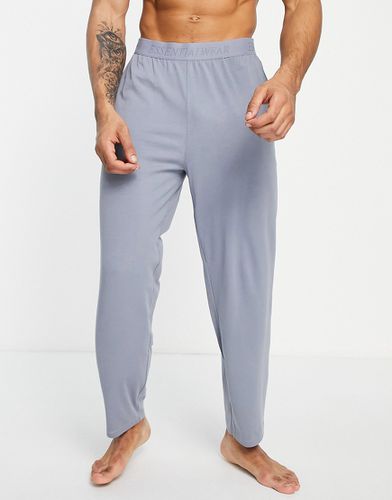 Essentialwear - Pantaloni del pigiama da casa con fascia in vita in rilievo-Verde - ASOS DESIGN - Modalova