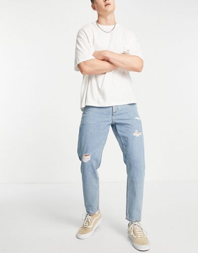 Jeans classici rigidi lavaggio medio con abrasioni-Blu - ASOS DESIGN - Modalova