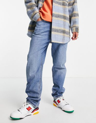 Jeans dad stile anni '90 lavaggio medio-Blu - ASOS DESIGN - Modalova