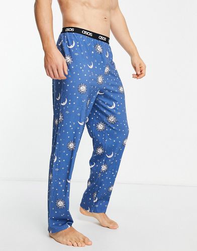 Pantaloni del pigiama da casa con stampa spaziale-Multicolore - ASOS DESIGN - Modalova