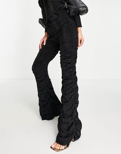 Pantaloni neri in chiffon increspati in coordinato - ASOS Luxe - Modalova