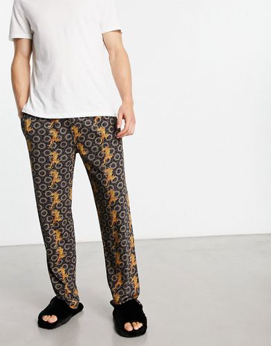 Pantaloni del pigiama in jacquard color oro con fascia in vita nera - Ed Hardy - Modalova