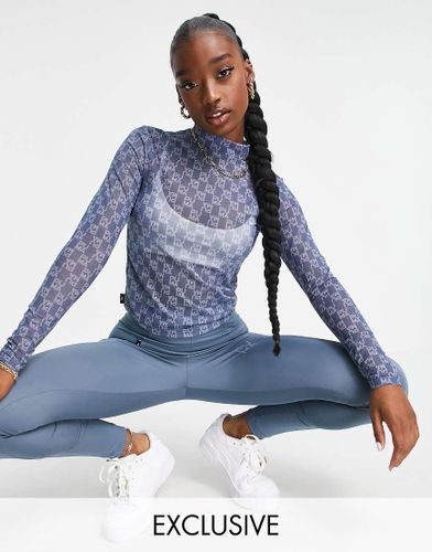 Infuse - Top attillato a maniche lunghe blu con stampa - Puma - Modalova