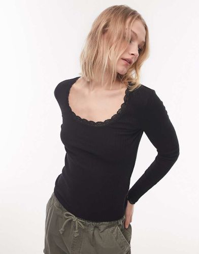 Top a maniche lunghe in pizzo nero traforato-Black - Topshop - Modalova